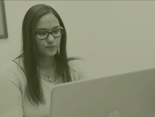 A woman on a laptop