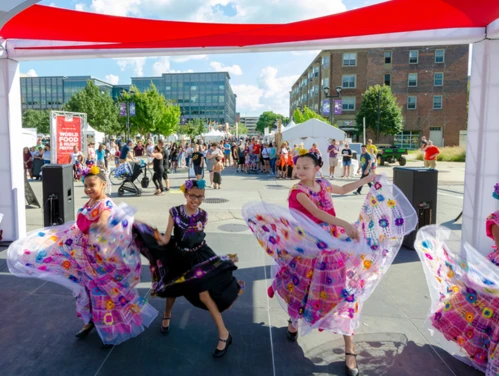 Costumed dancers performing