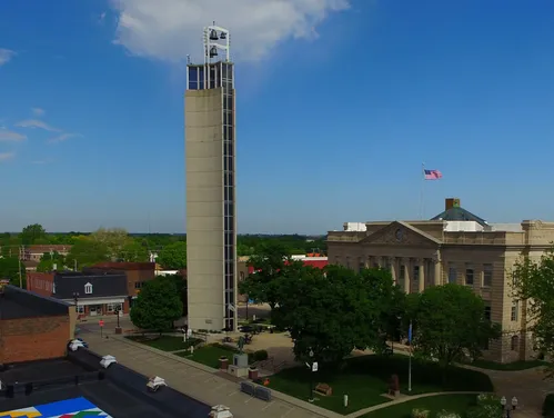 Tower and buildings with street scene from above 