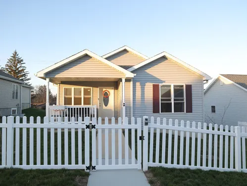 House with white fence