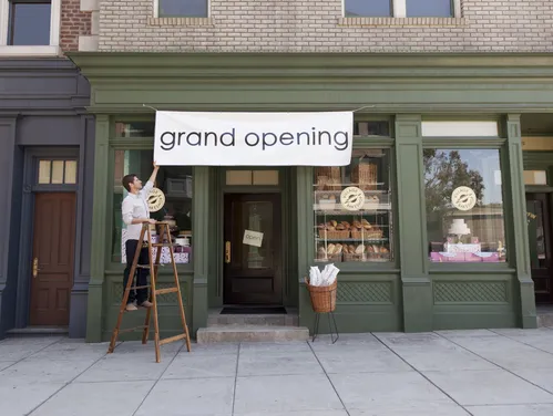 Grand opening sign for small bakery business