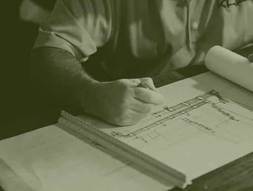 architect working on paper sketch