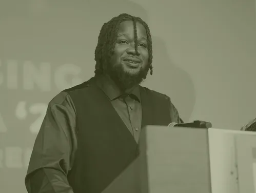 Man speaking at podium