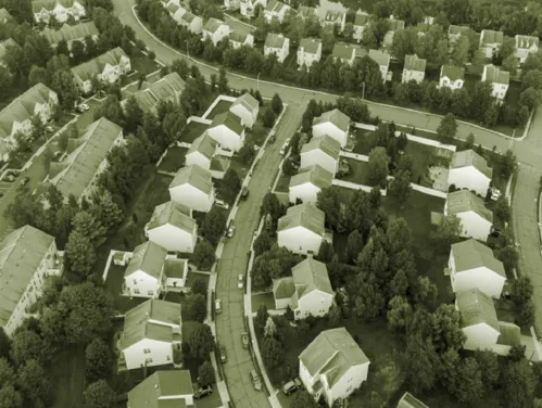 Aerial view of neighborhood houses and streets