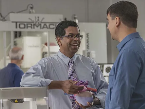 Businessmen talking to each other