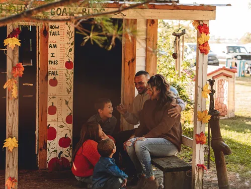 Family outdoors in fall