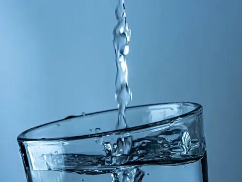 Water pouring into a glass
