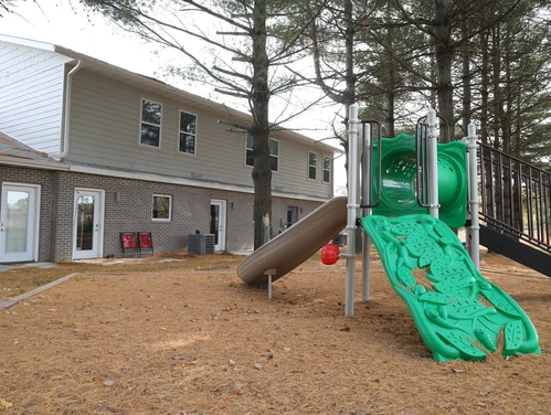 Back of apartments with play equipment