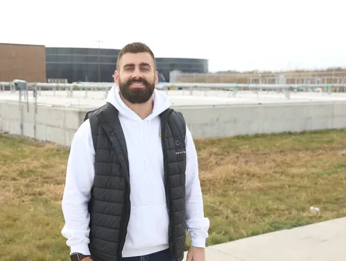 The City Administrator of Nevada in front of the city's water treatment plant