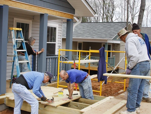 Construction workers building a home