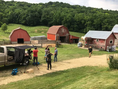 Film set near red barns