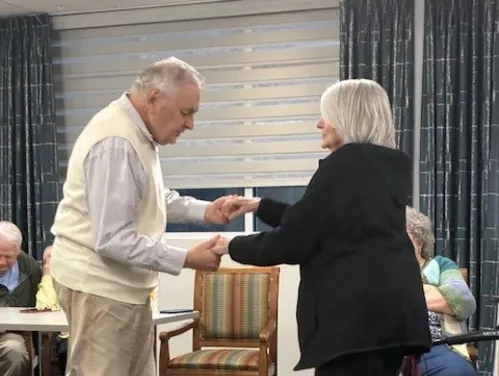 Senior couple dancing.