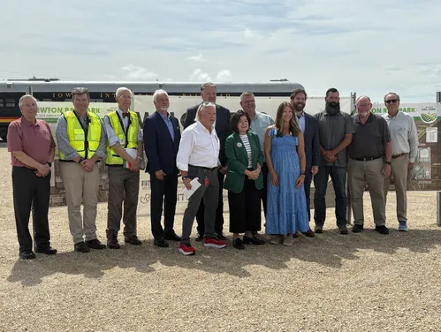Group in front of train
