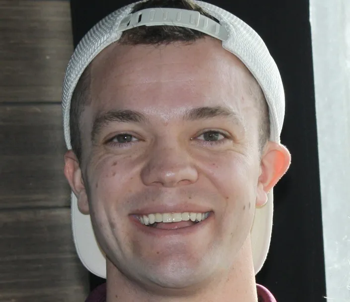 Man with backwards hat 