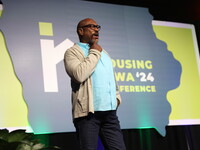 Man speaking into a microphone