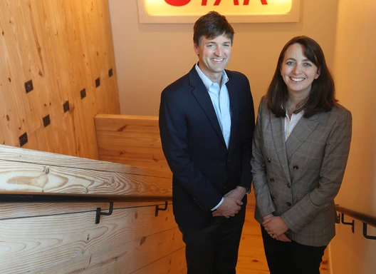 Scott and Molly Cutler standing in Star Lofts