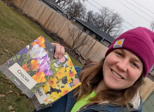 Woman holding flower packets