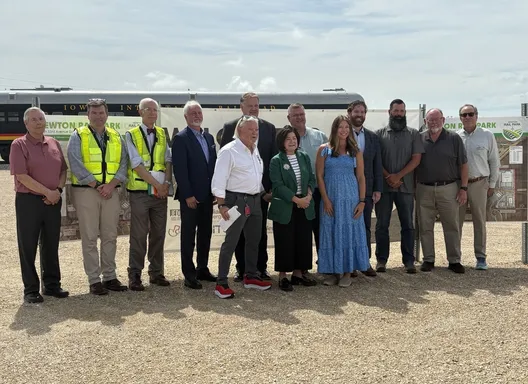 Group in front of train