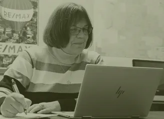 A woman on a computer