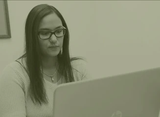 A woman on a laptop