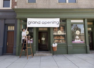 Grand opening sign for small bakery business