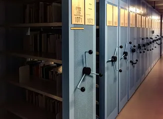Archives - books in shelves in room
