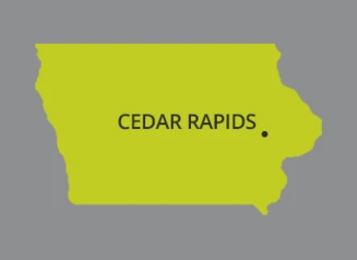 Green map of Iowa with Cedar Rapids pinpointed
