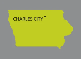 Green map of Iowa with Charles City pinpointed