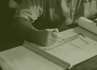 architect working on paper sketch