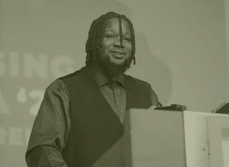 Man speaking at podium