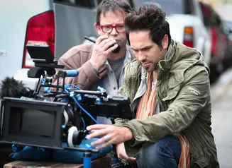 Two men behind a movie camera