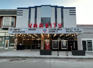 Exterior of the Varsity Cinema showing current and upcoming attractions