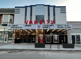 Exterior of the Varsity Cinema showing current and upcoming attractions