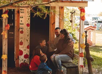 Family outdoors in fall