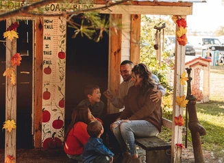 Family outdoors in fall