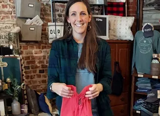 Anna Wilson of Glyn Mawr- The Local in front of things for sale