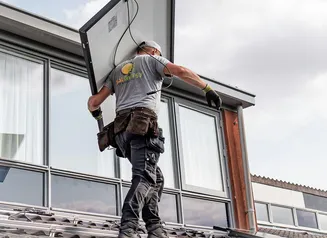 Solar panel installation on a roof