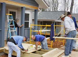 Construction workers building a home