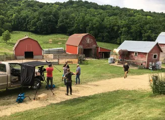 Film set near red barns