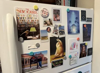 Fridge with magnets and photos.