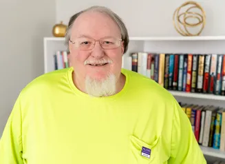 Man in neon yellow shirt