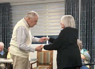 Senior couple dancing.