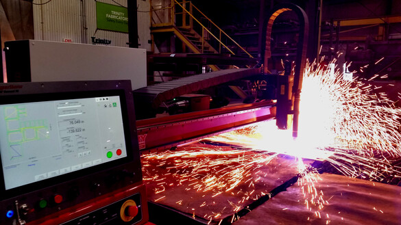 Close up view of a CNC plasma cutter at work