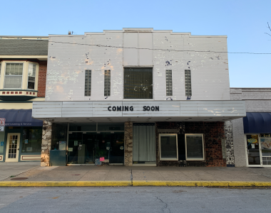 Closed Varsity Theater with the words "Coming Soon" on the marquee