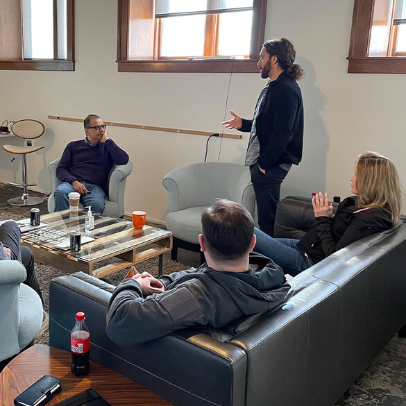 Group of people meeting at the Global Insurance Accelerator