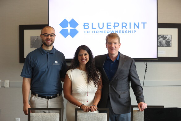 group of presenters posing for a photo