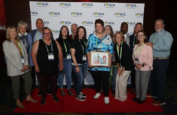group of people from Lived Experience posing with an award